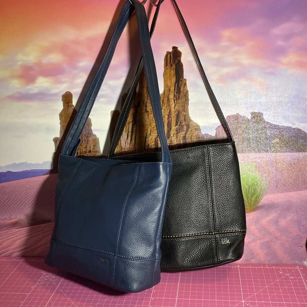 (NEW Blue), and (black NWOT) The Sak genuine Leather De Young style bags.